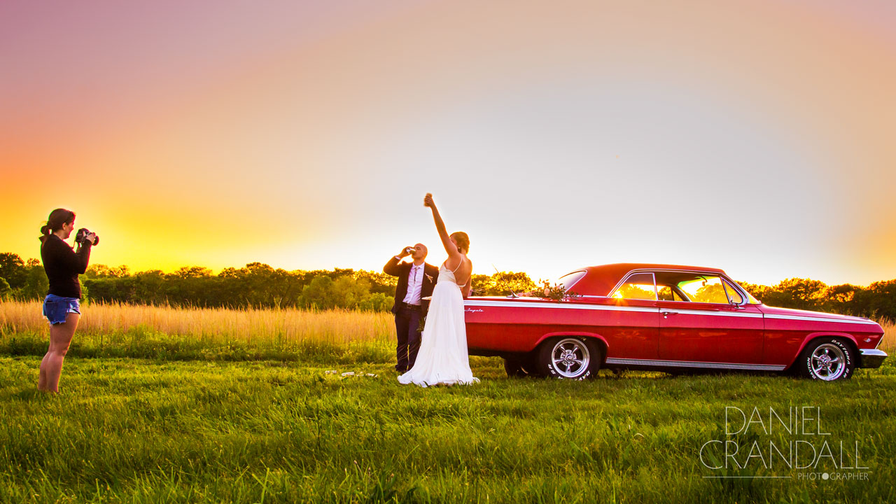 Wedding couple portraits with vintage car and sunset